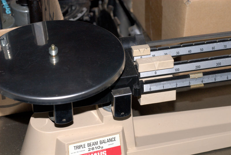 photo of
        scale to weigh the test mass
